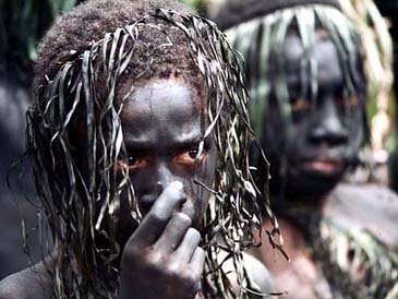 Papua New Guinea boys raiding a neighboring village